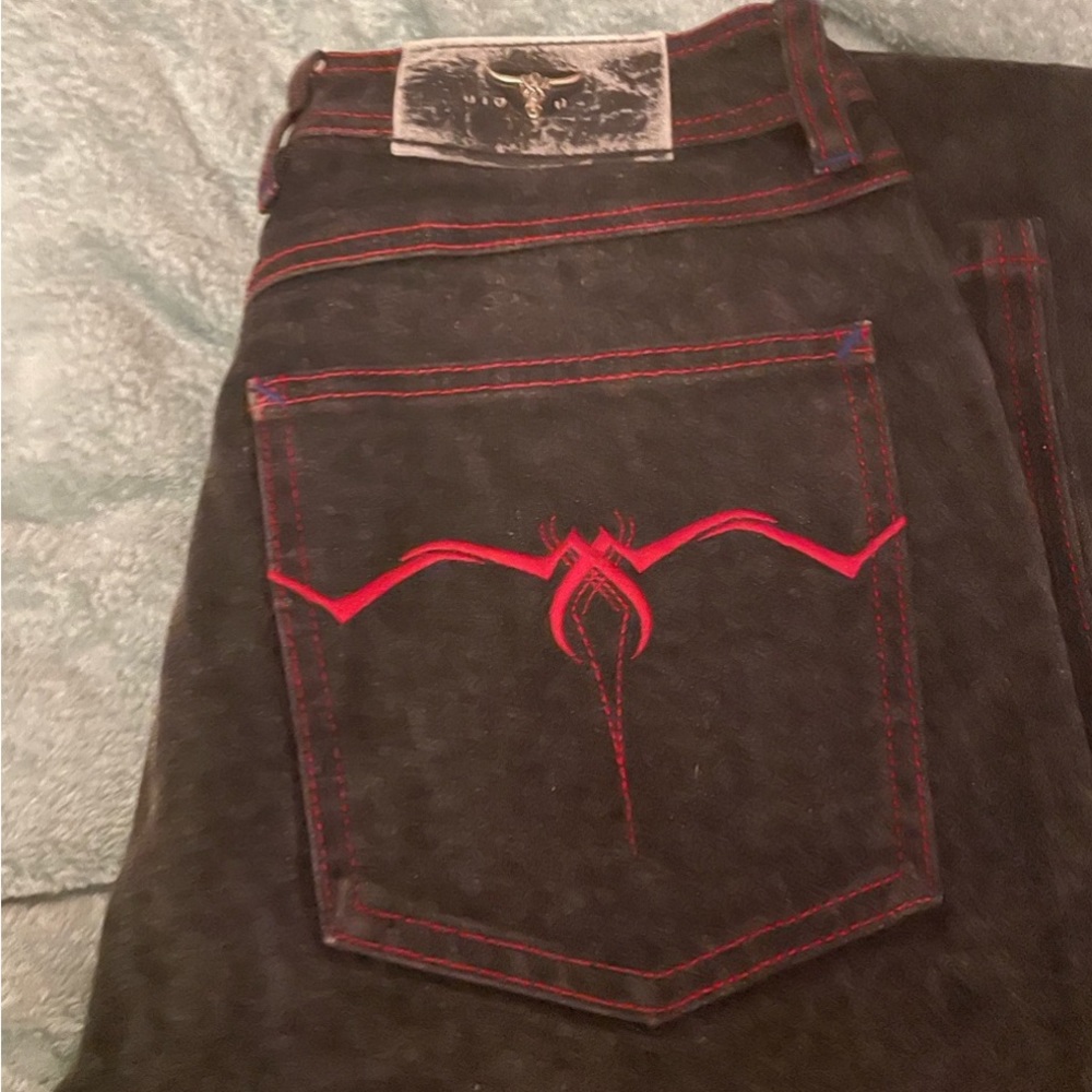 Sergio Valente black slim boot cut. Red stitching.